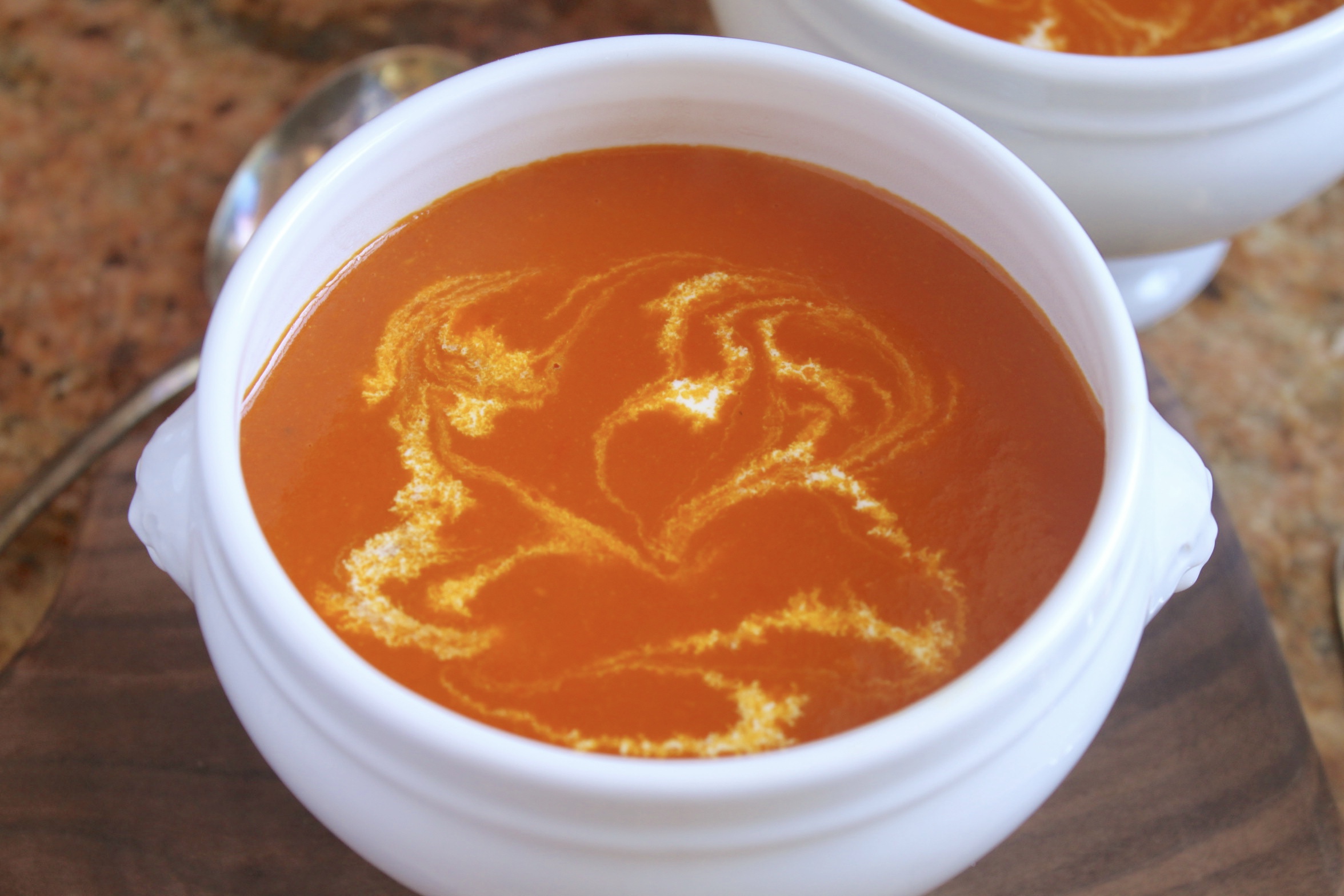 tomato turmeric soup in a bowl