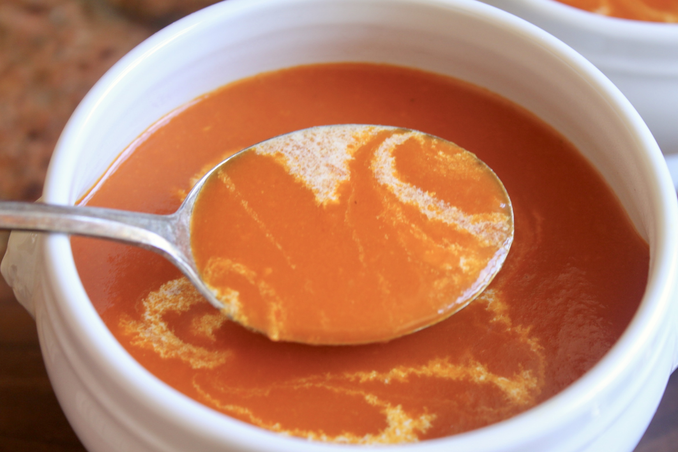 spoonful of tomato turmeric soup