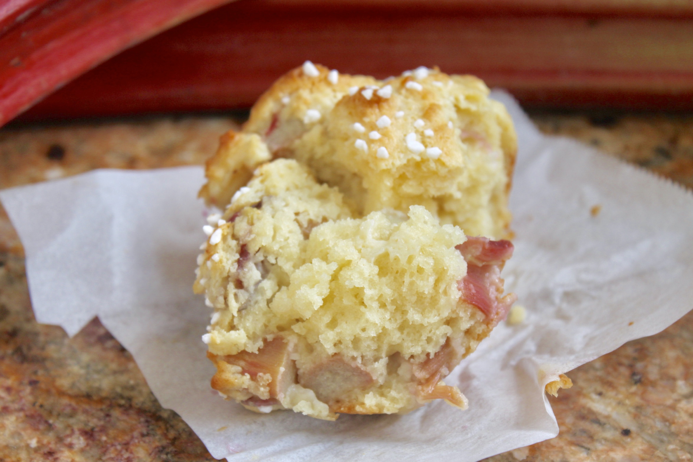 rhubarb muffin split open to see the fluffy interior