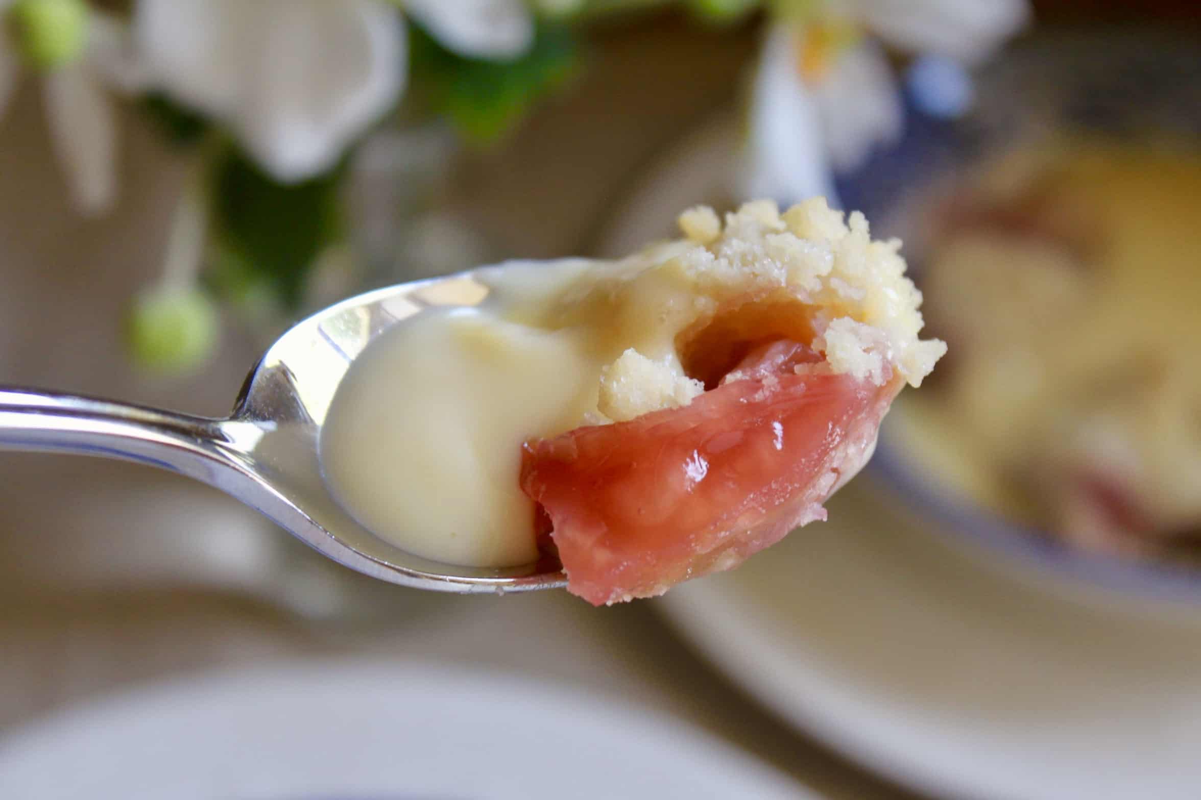 spoonful of crumble and custard