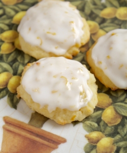 lemon ricotta cookies on a lemon plate