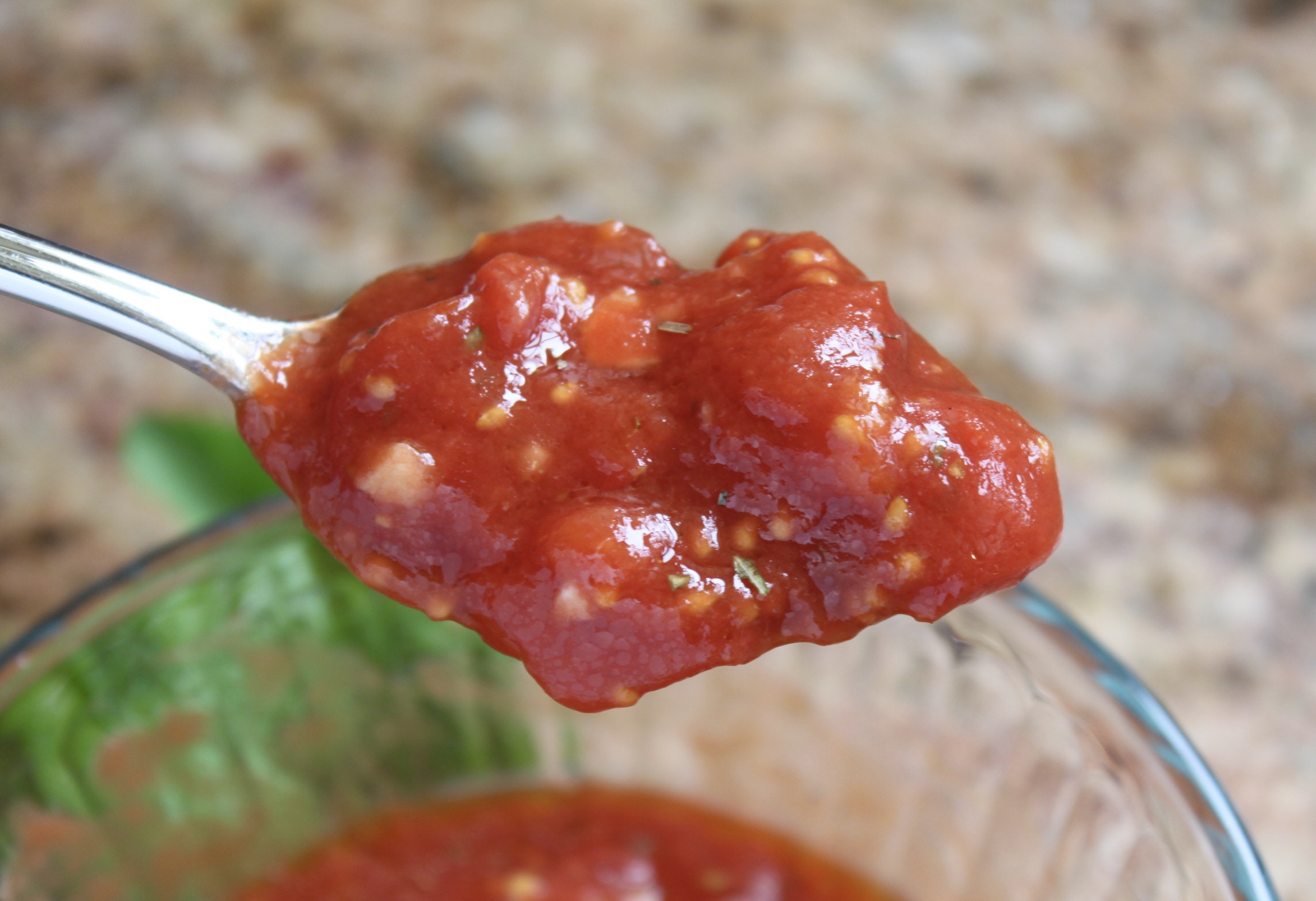 pizza sauce in a spoon