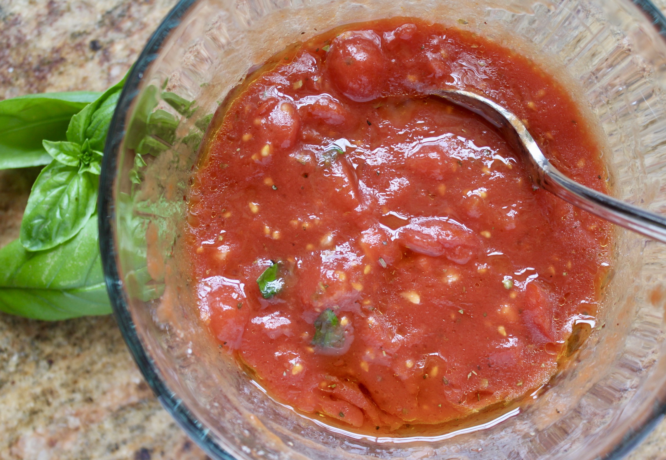best pizza sauce in a bowl with a spoon