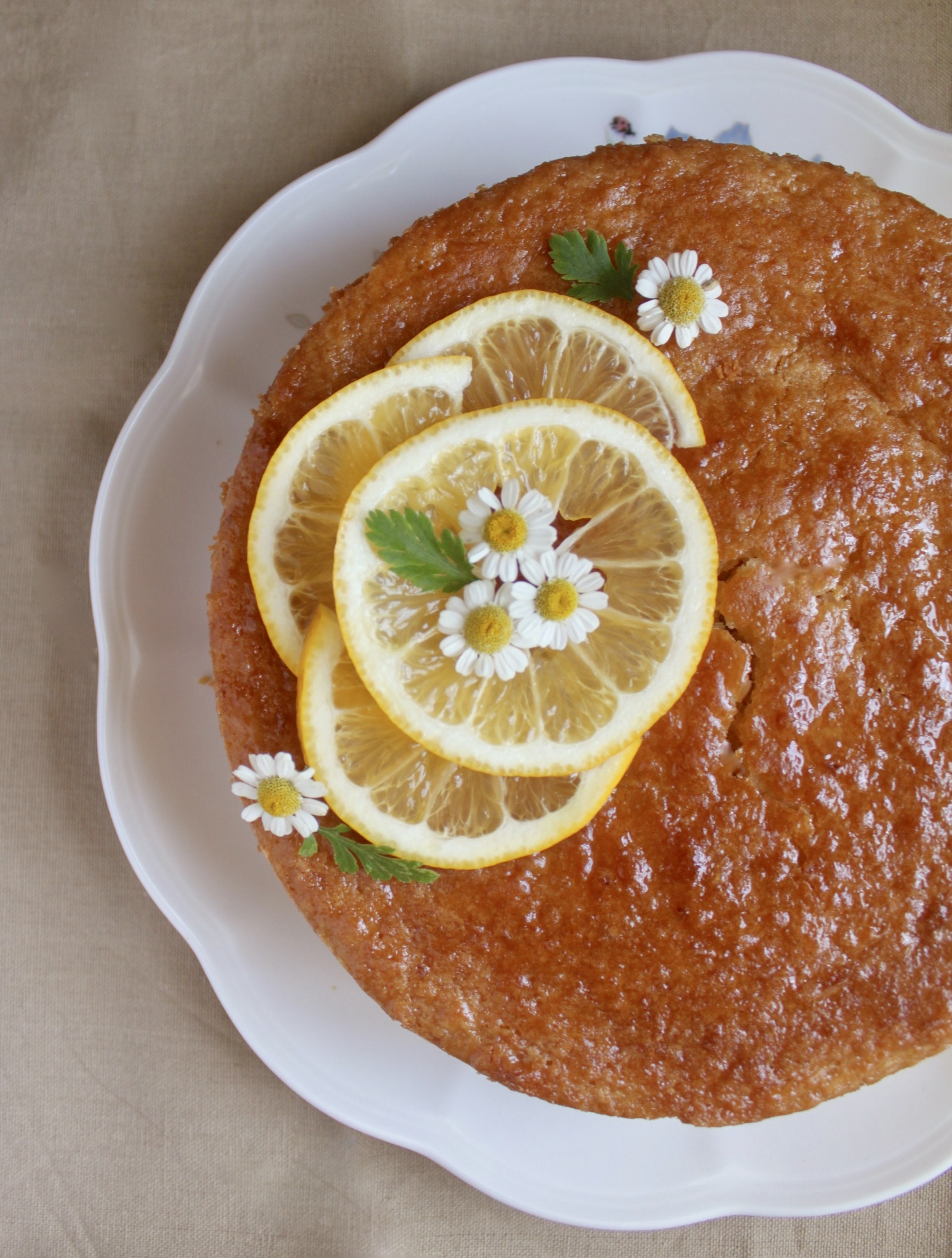 overhead gluten free lemon cake on a plate