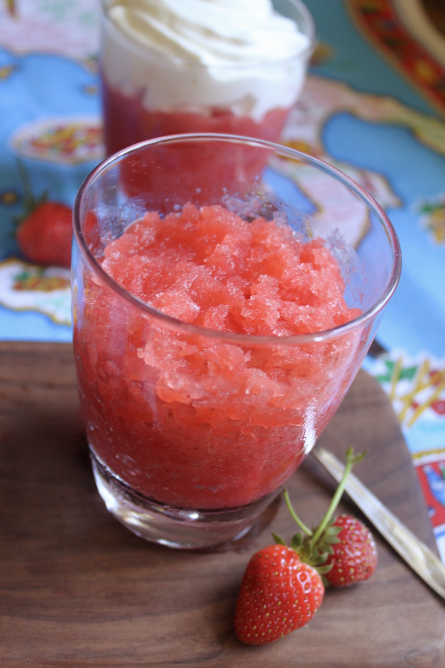 serving strawberry ice in a glass