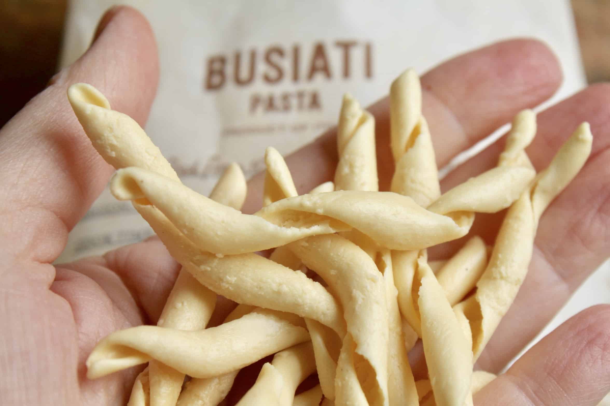 busiati pasta in a hand