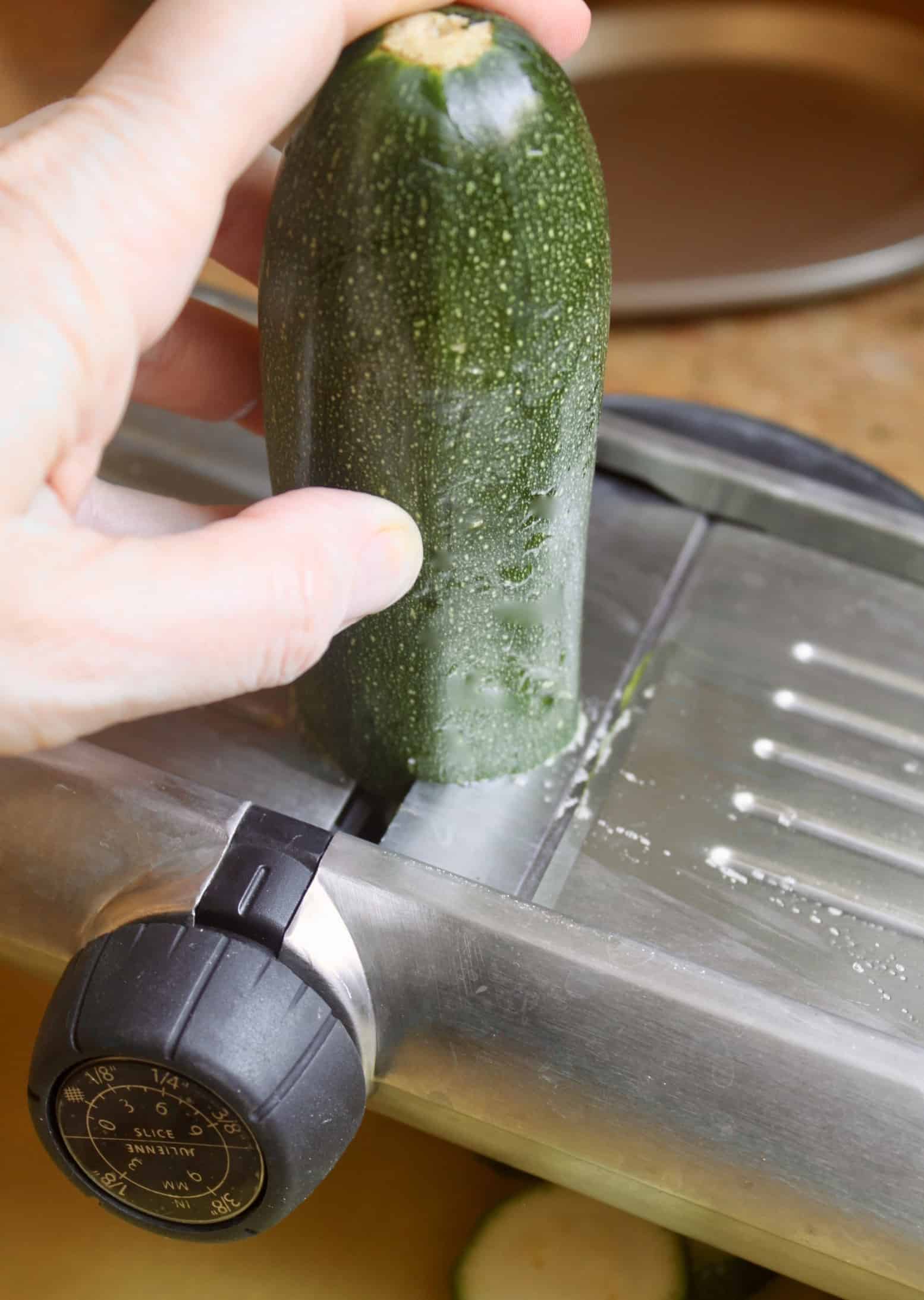 slicing zucchini with mandoline