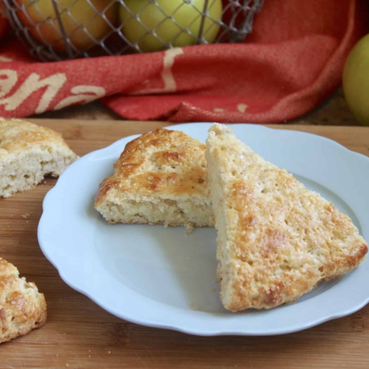 two apple scones on a blue plate