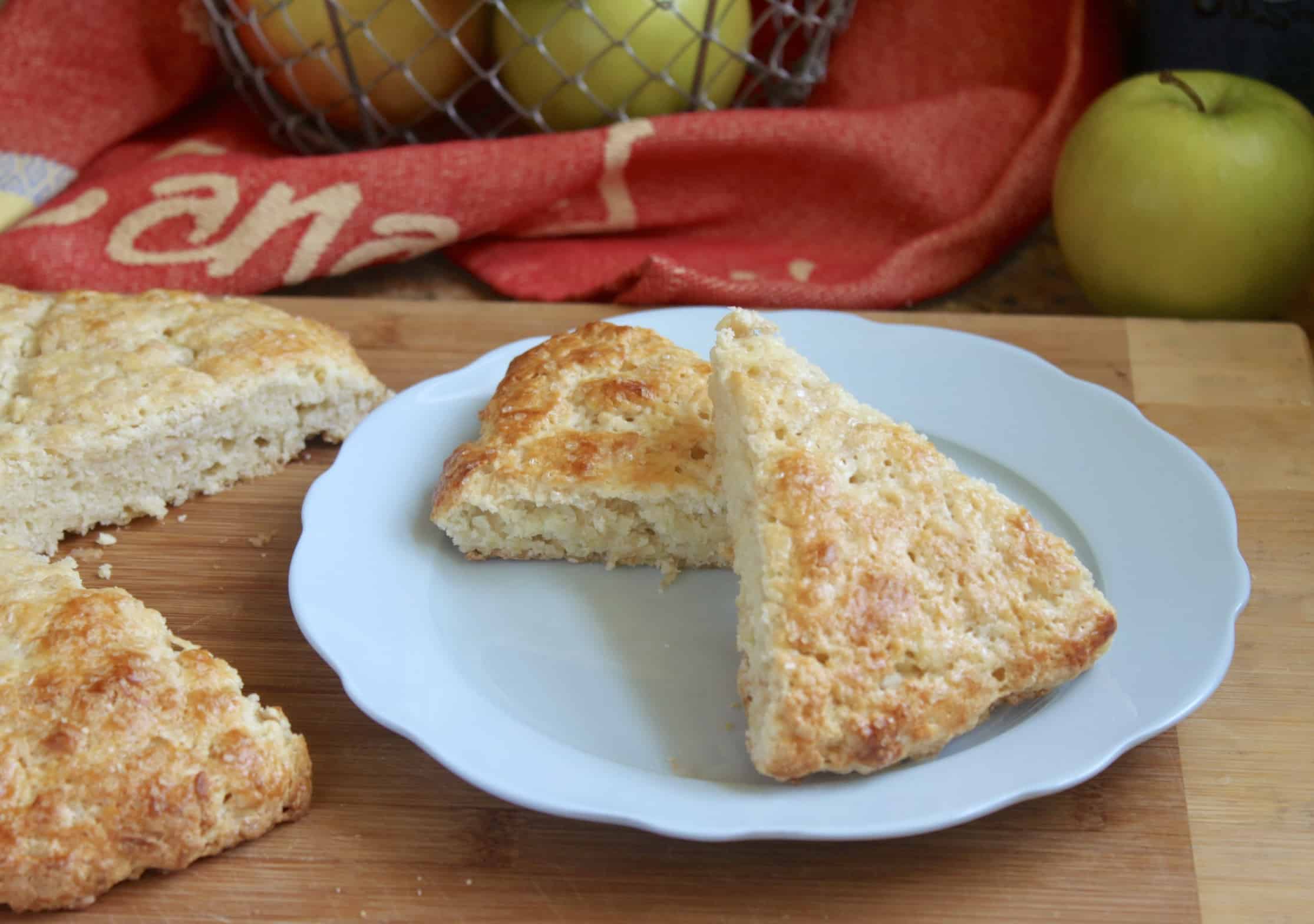 two apple scones on a blue plate