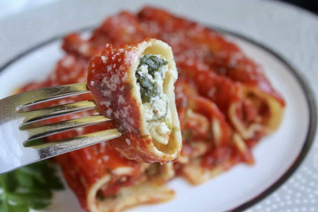 piece of manicotti on a fork