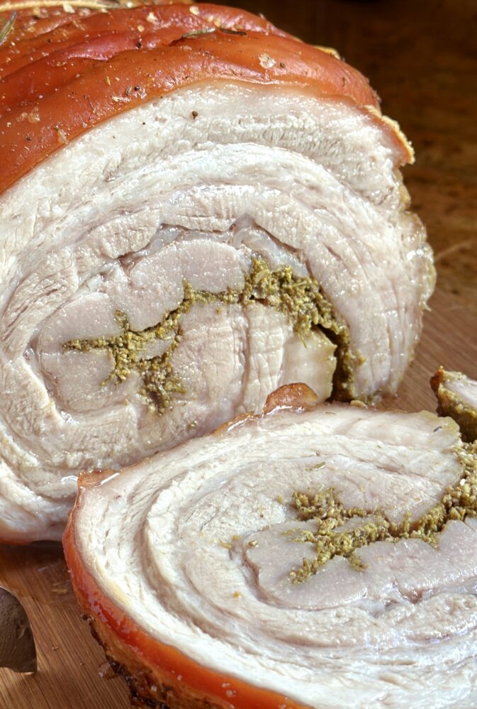 slicing porchetta