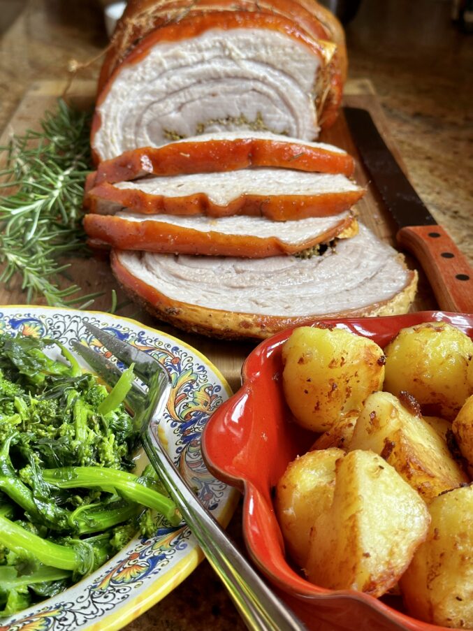 rapini with roast potatoes and porchetta roast