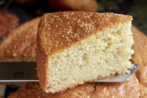 pear cake slice on a knife