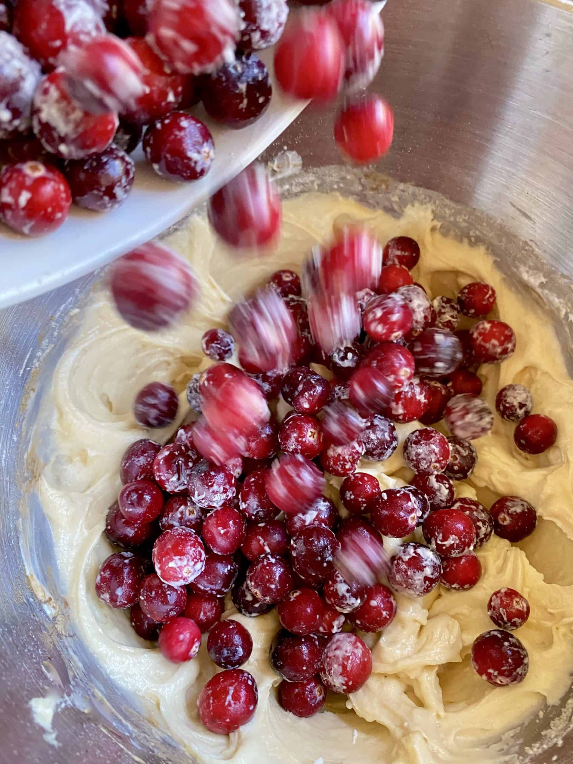 adding cranberries to batter