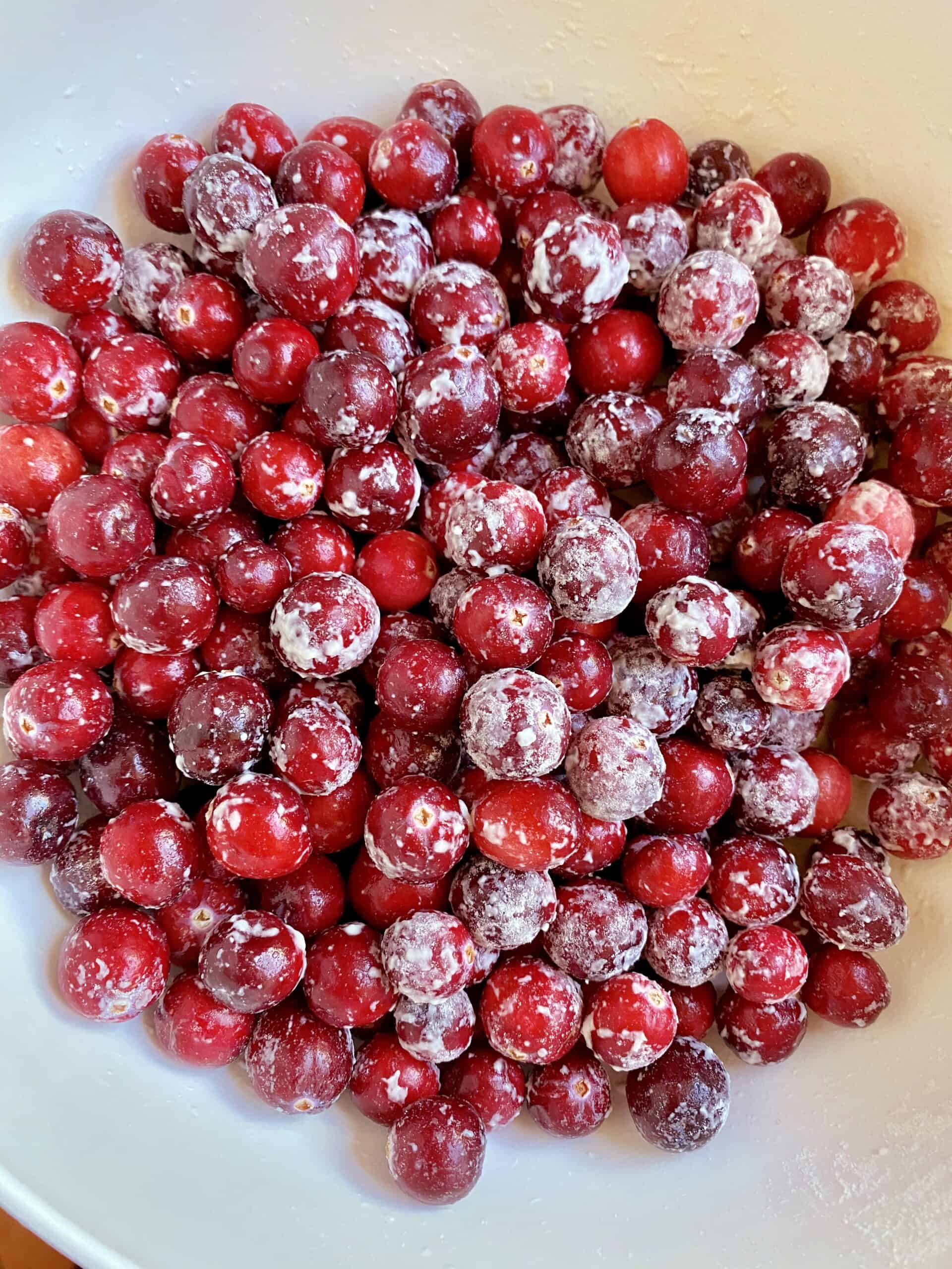 floured cranberries in a bowl
