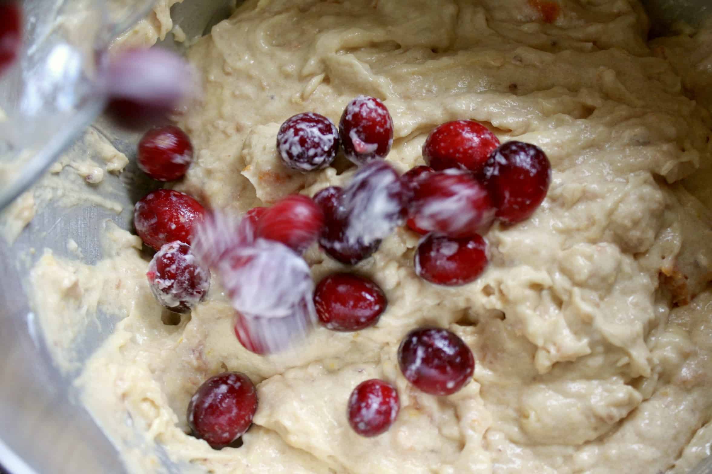 adding fruit to the cake