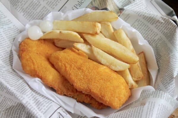 fish and chips on newspaper