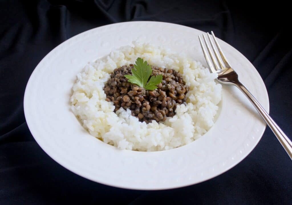 lentils and rice in a white bowl for healthy meals on a budget