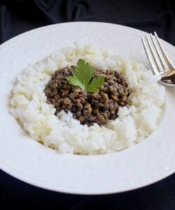 lentils and rice in a white bowl