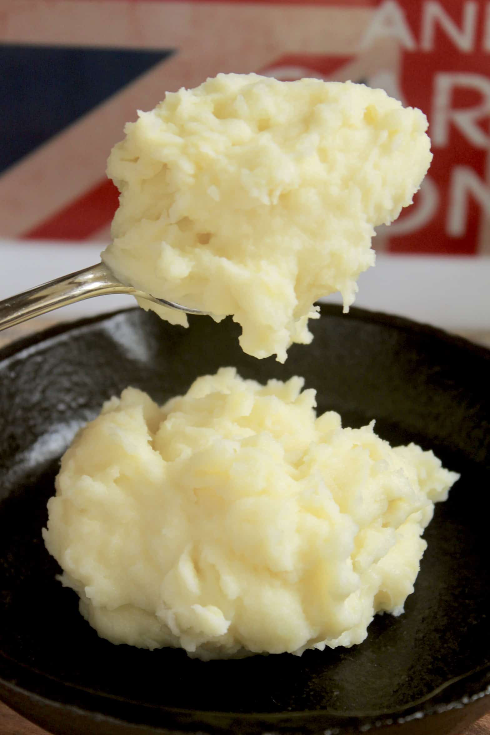 spooning out mashed potatoes