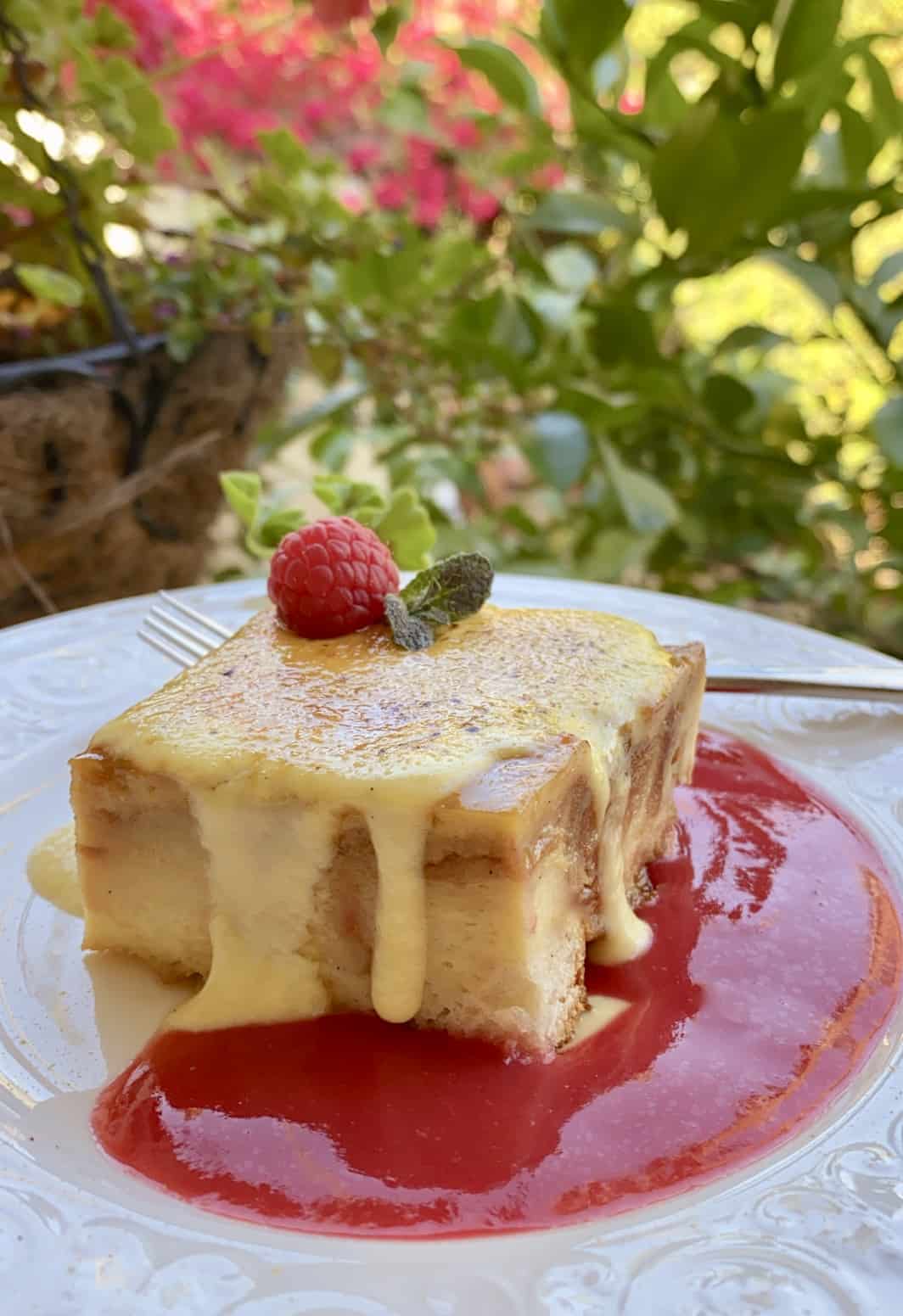 custard bread pudding with raspberry coulis