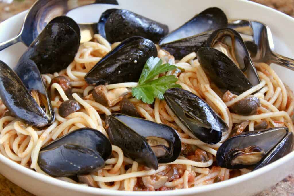 Mussel pasta in a bowl using canned tomatoes