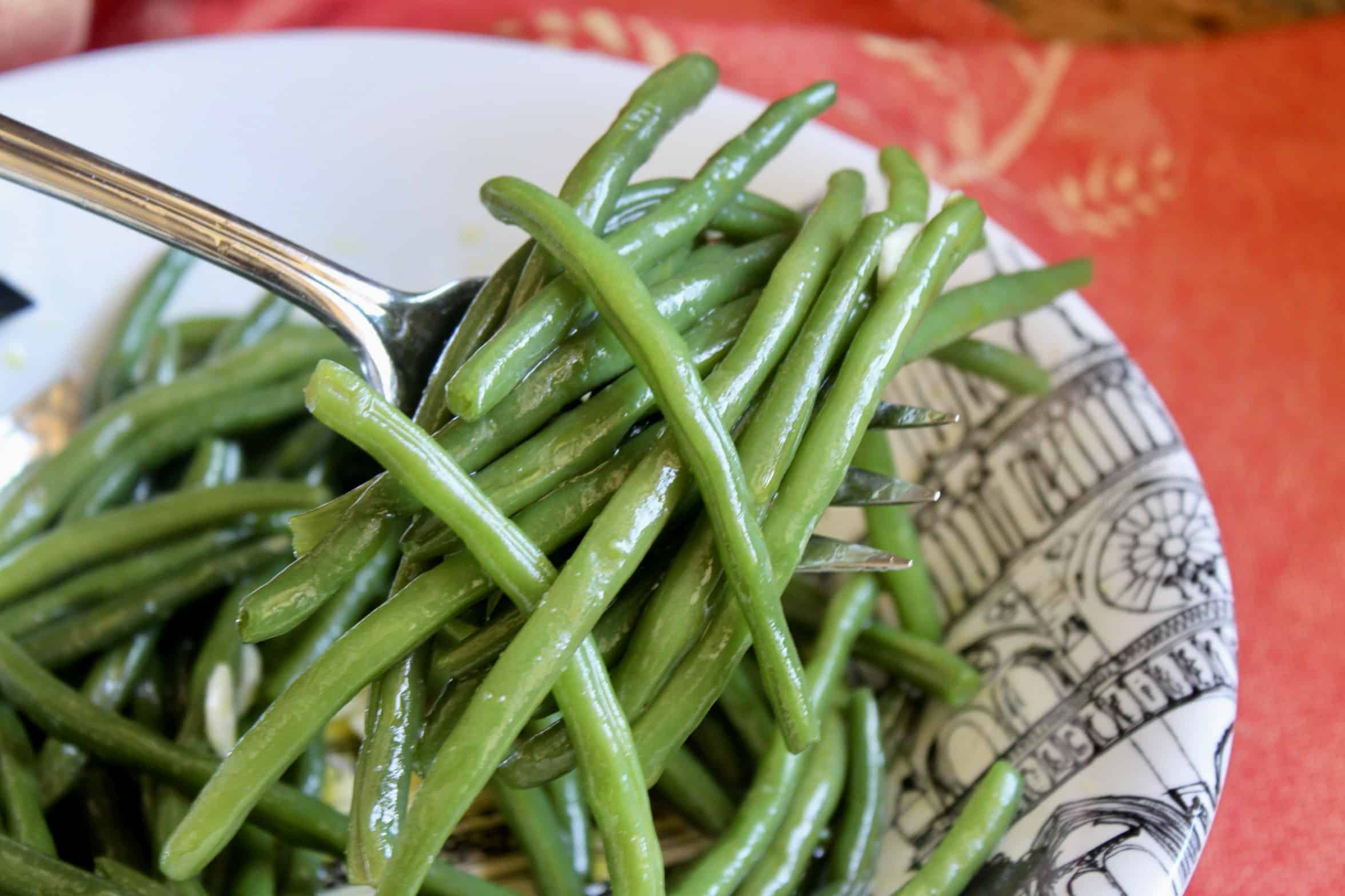 green bean salad on a serving fork