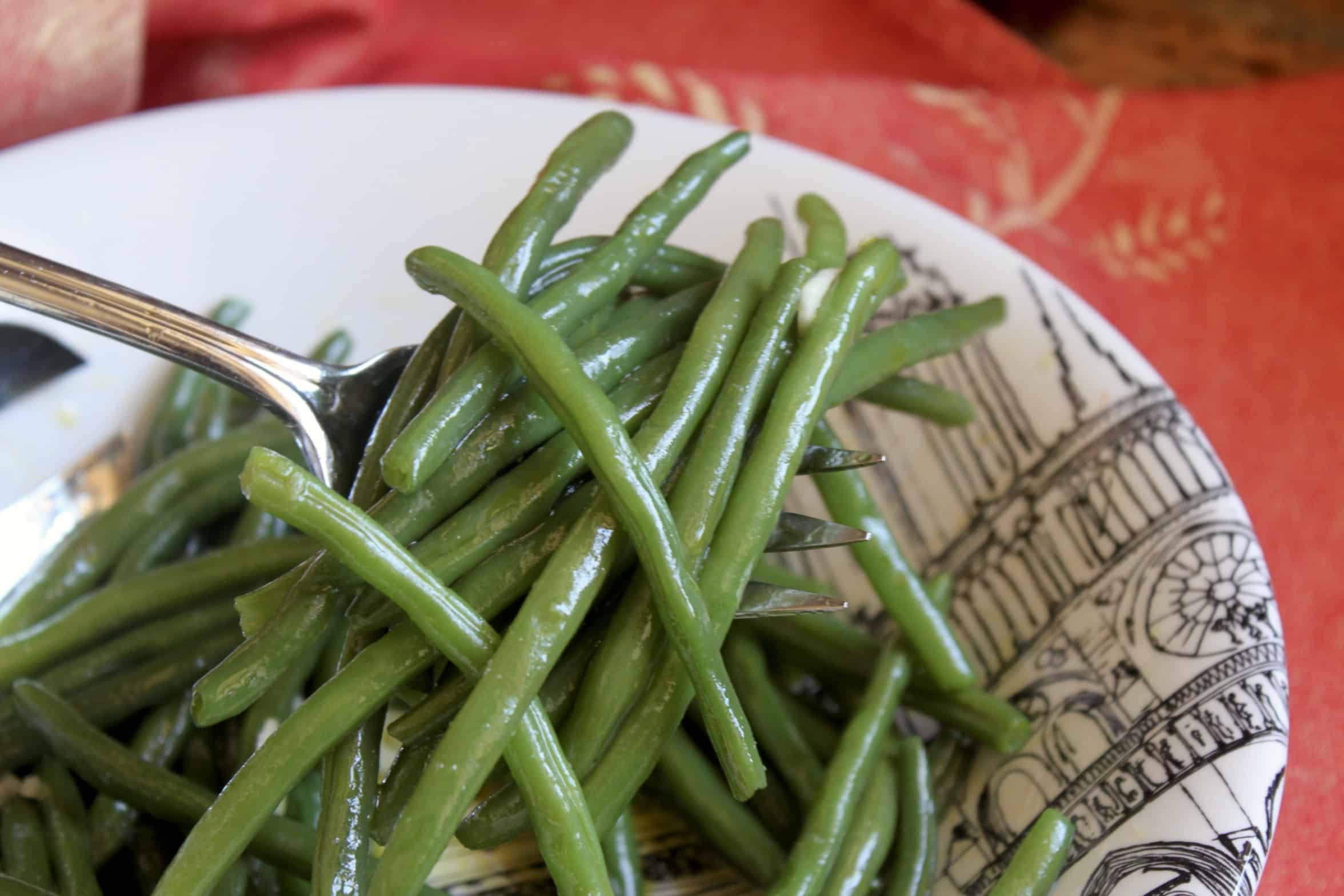 green bean salad on a serving fork