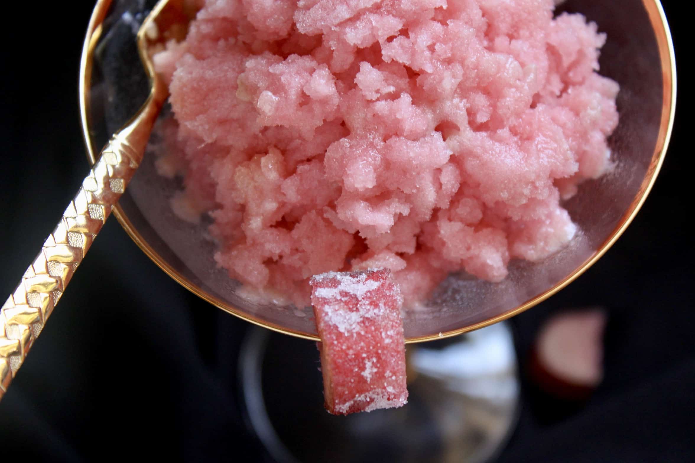 overhead rhubarb granita in a martini glass