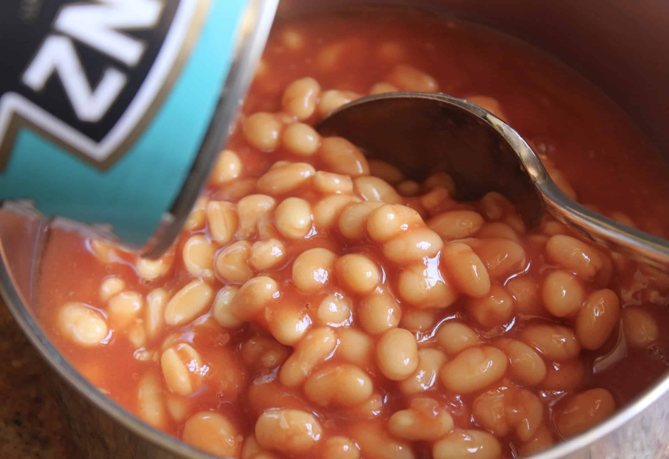 putting beans in a pot