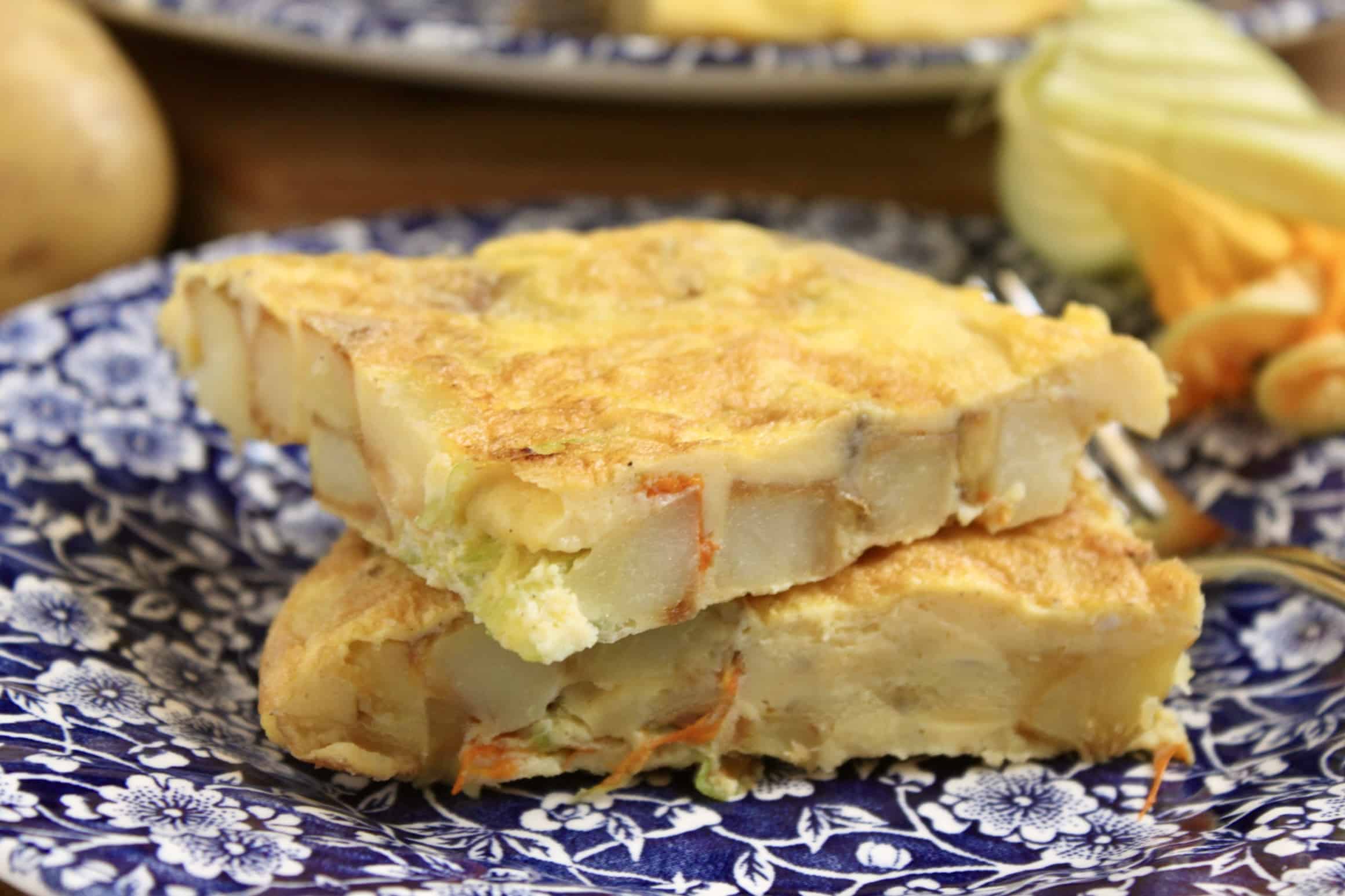 zucchini flower frittata on a plate