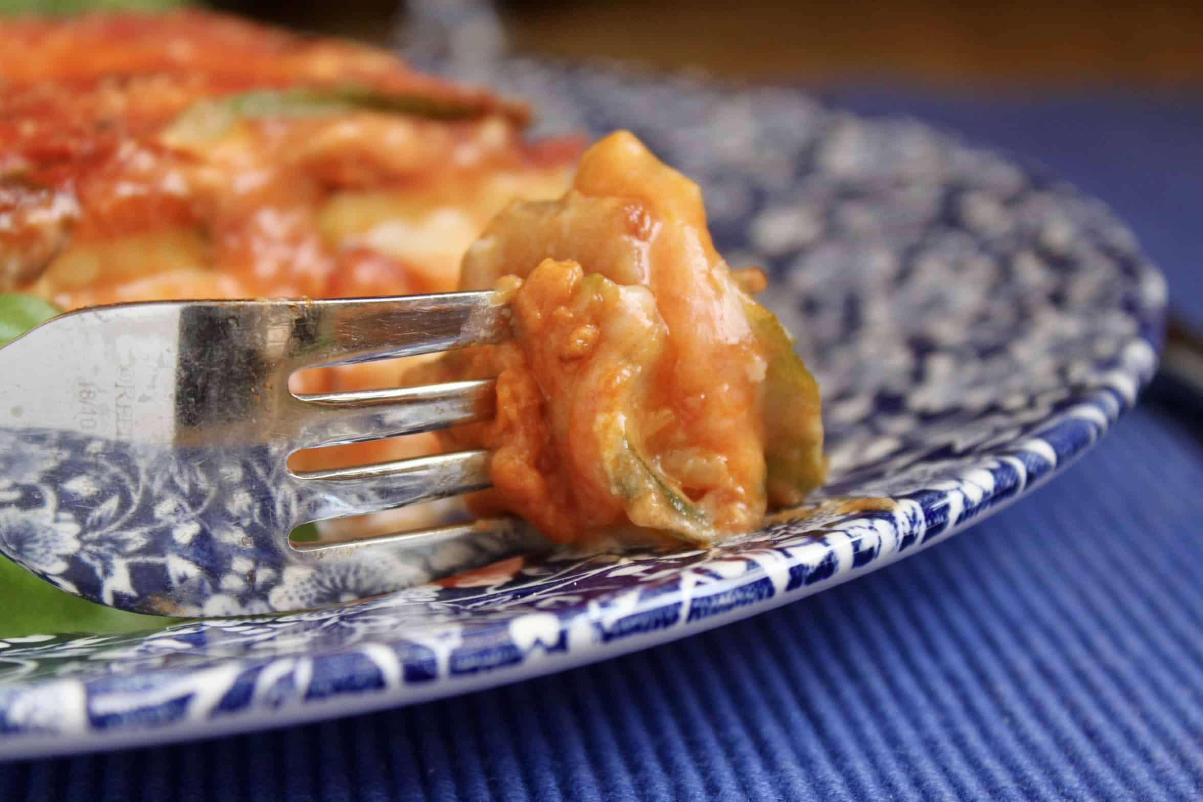 piece of zucchini lasagna on a fork