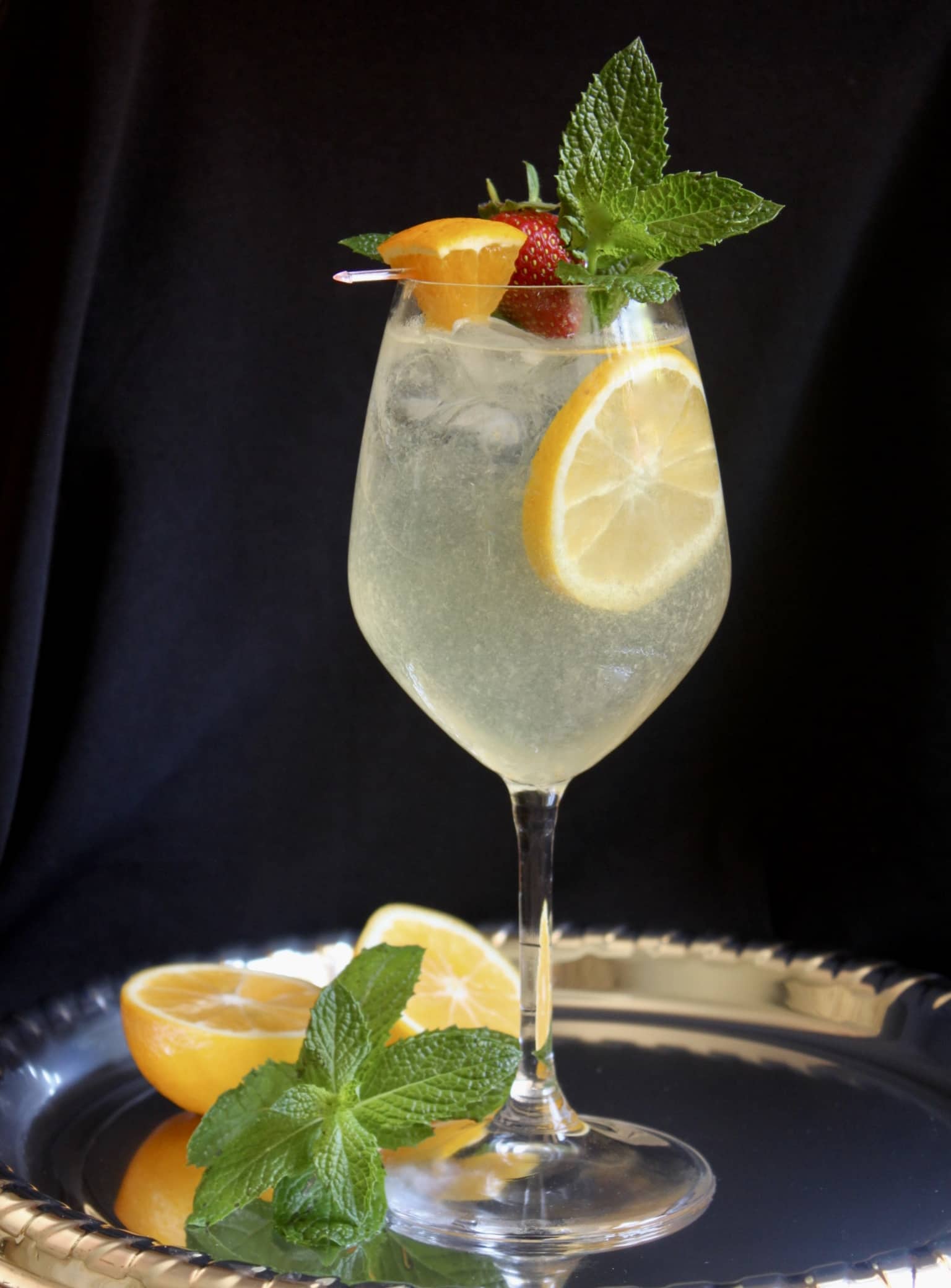 limoncello cocktail on a silver tray