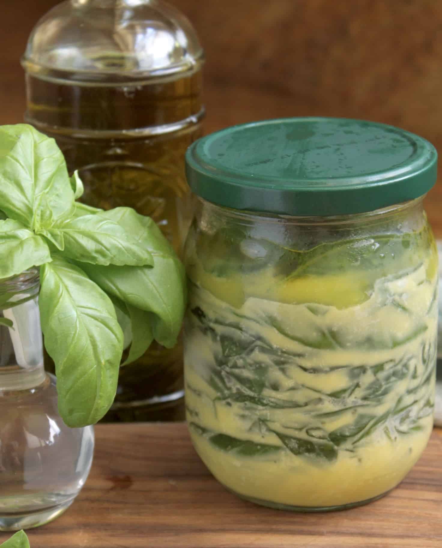 fresh and frozen basil with olive oil