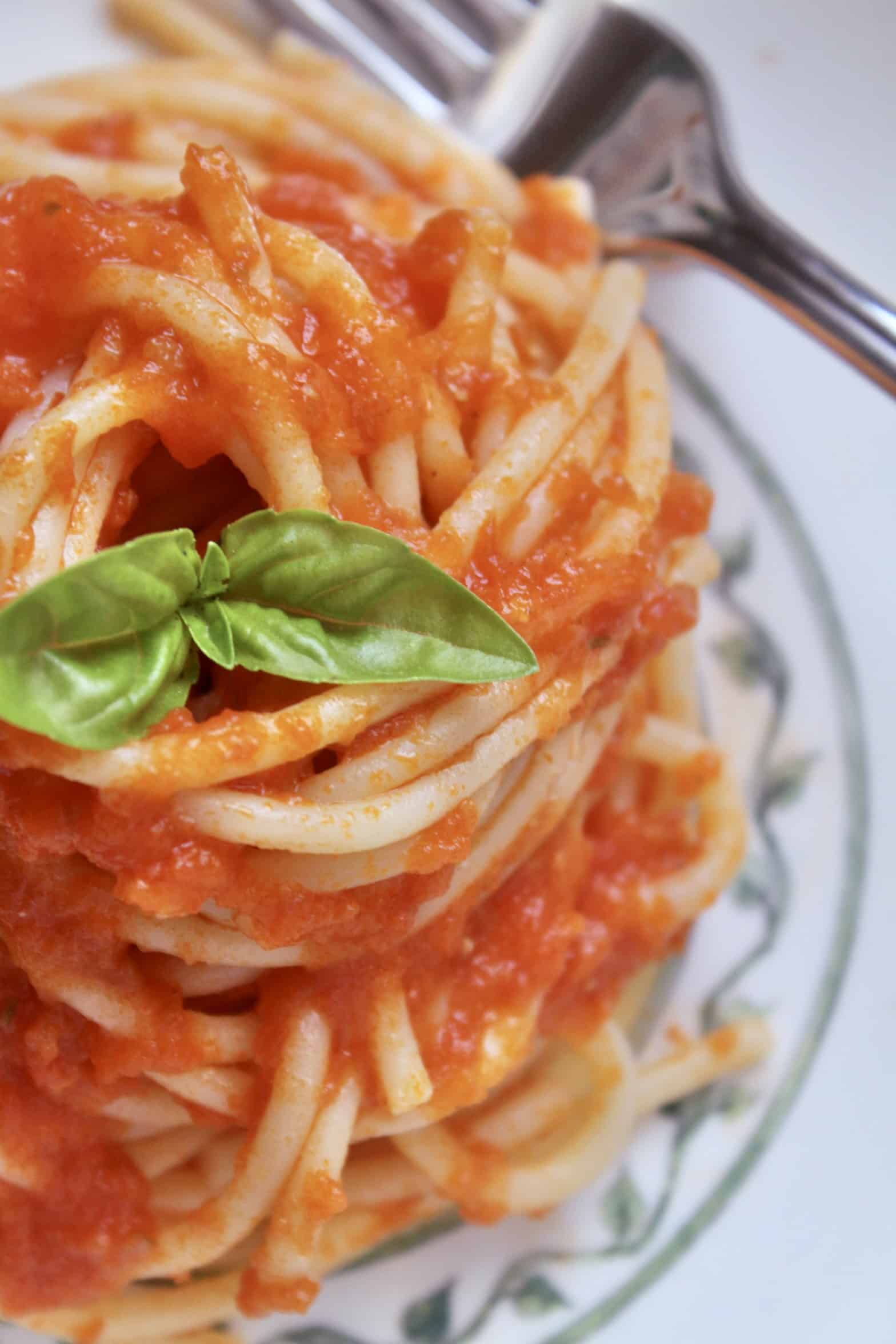 overhead shot of pasta with fresh tomato sauce