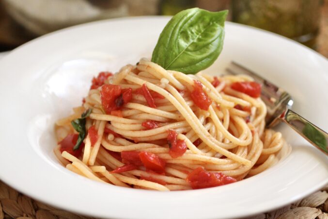 pasta sauce with fresh tomatoes on spaghetti