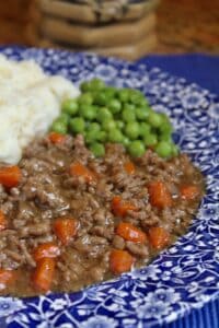 mince and tatties and peas on a plate