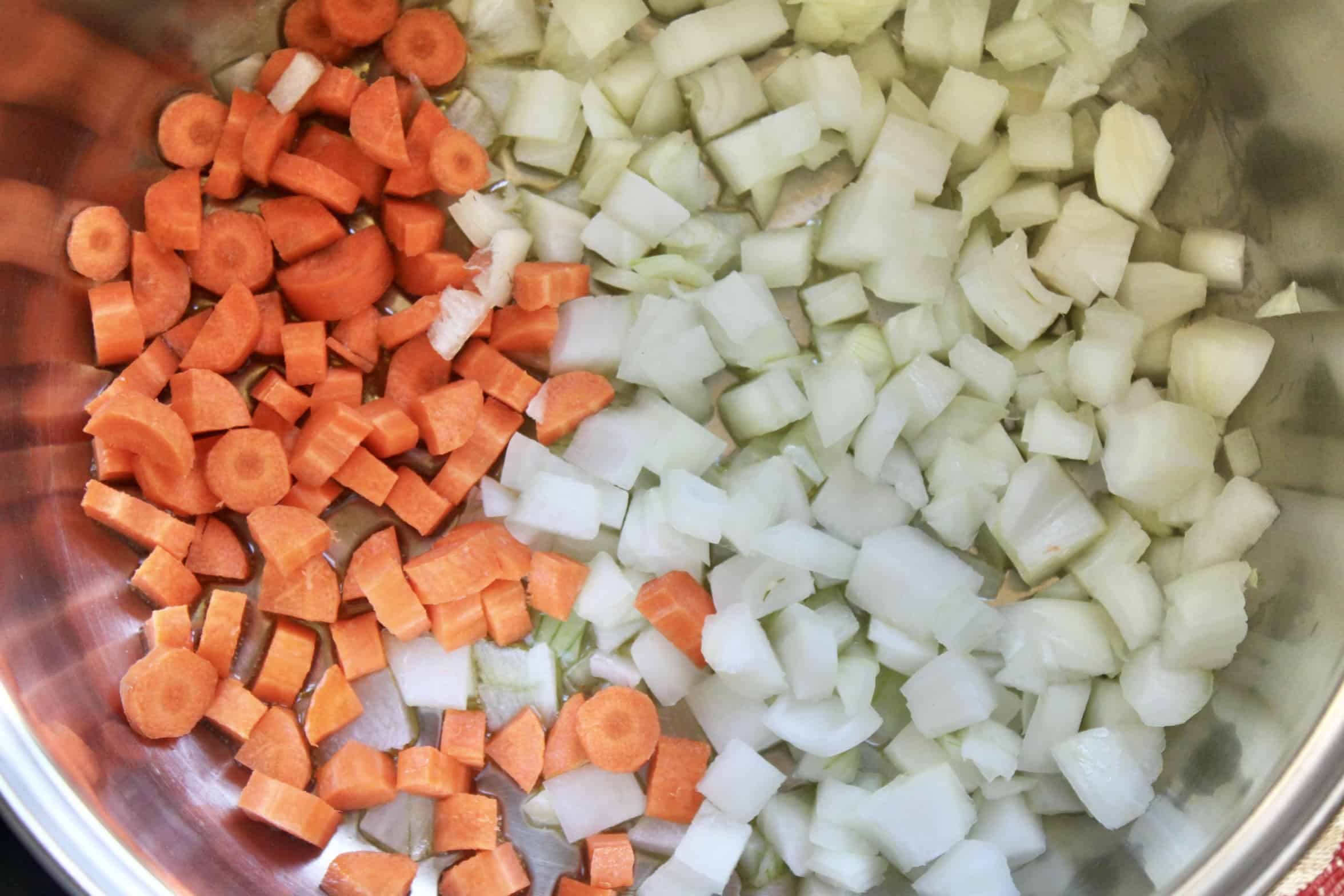 carrot and onion in a pot