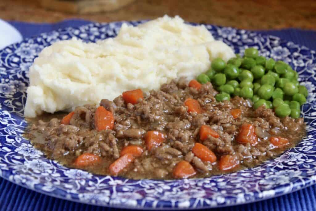 mince and tatties and peas on a plate