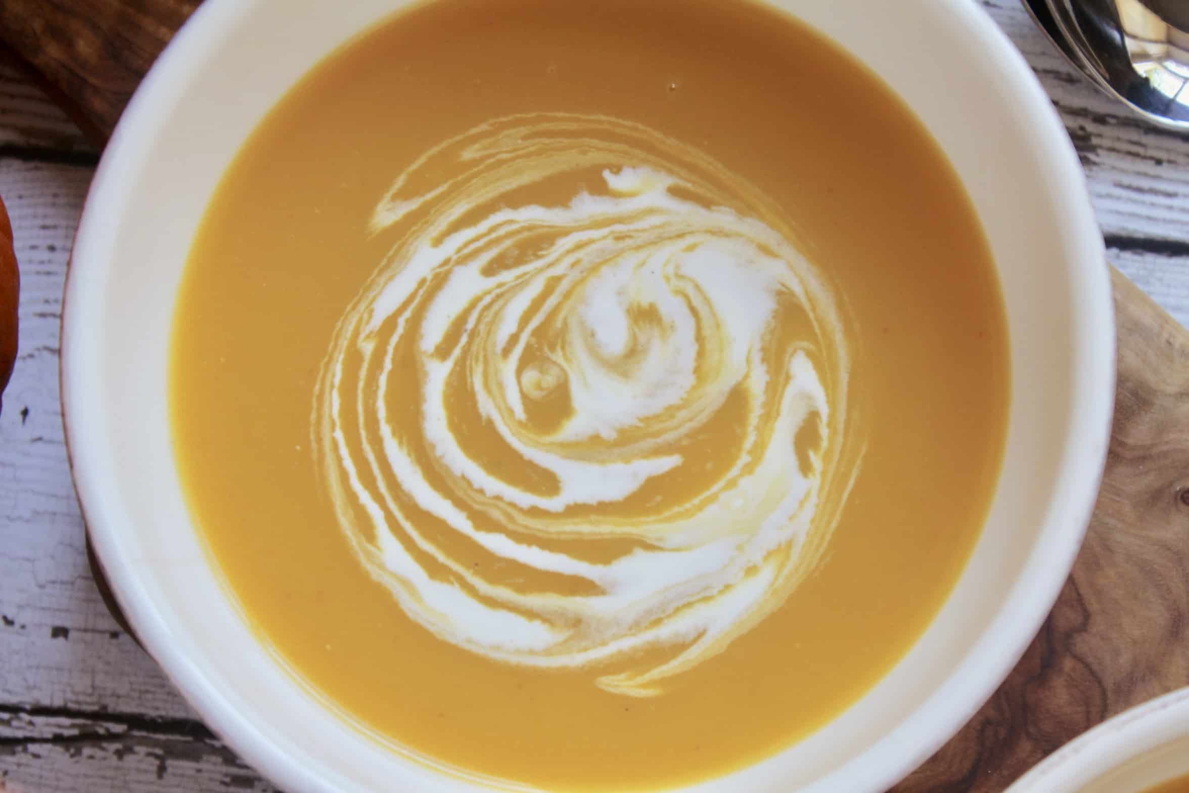 swirly pumpkin soup recipe in a bowl