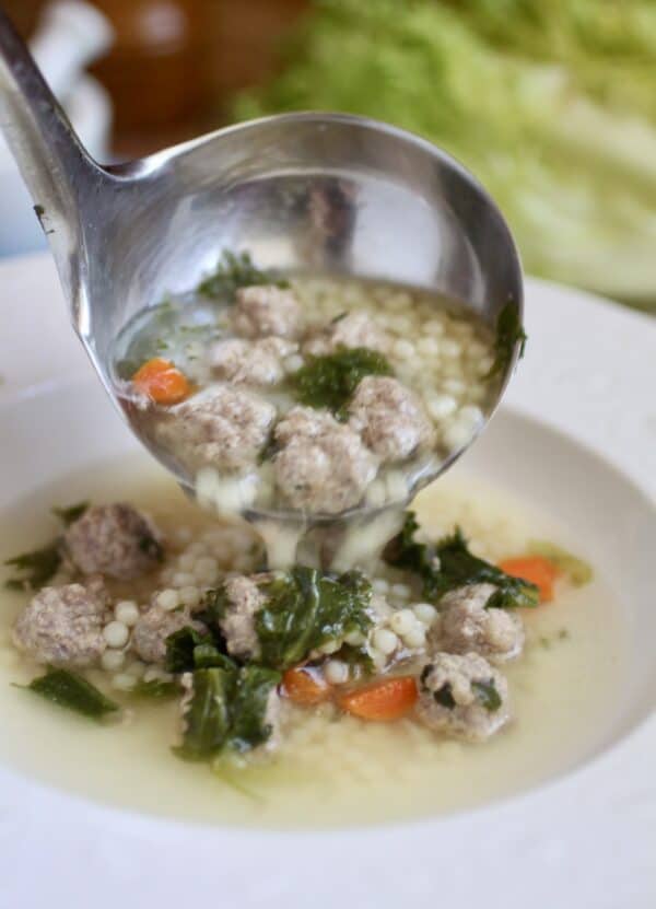 serving Italian wedding soup
