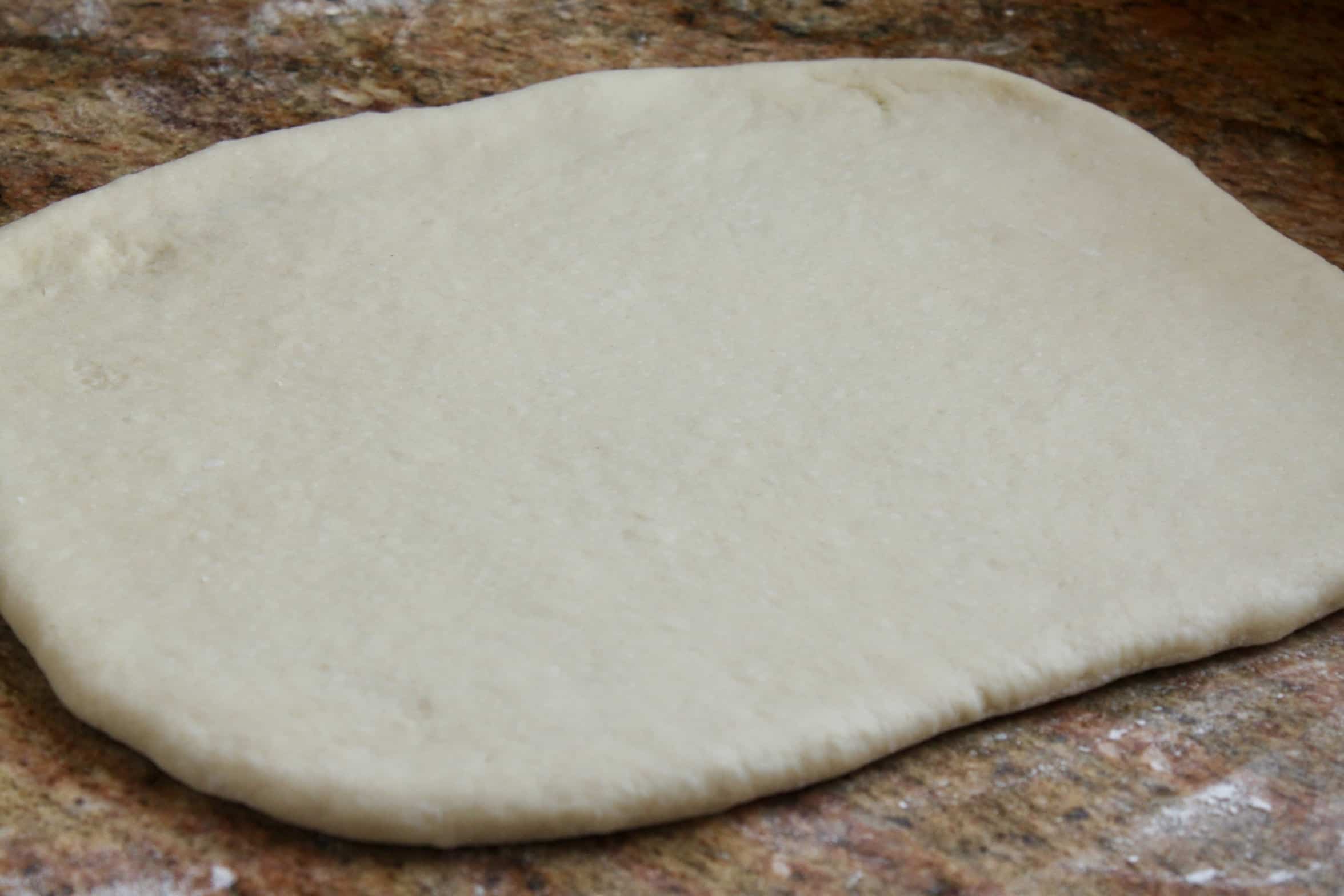rolling dough into rectangle