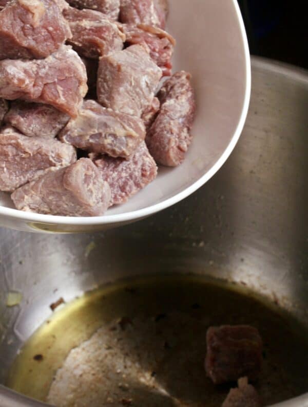 adding beef to pressure cooker