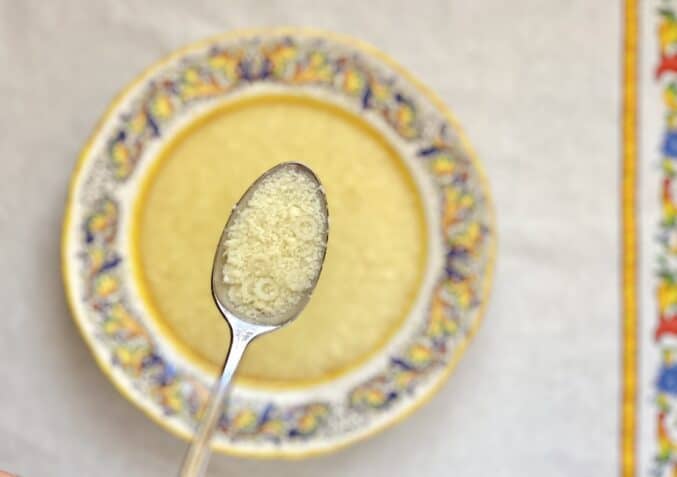 stracciatella and soup in a bowl