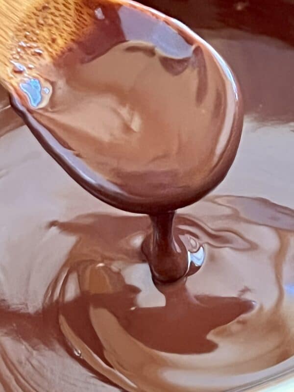 wooden spoon with chocolate sauce.