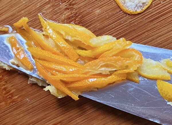 slicing kumquats for marmalade