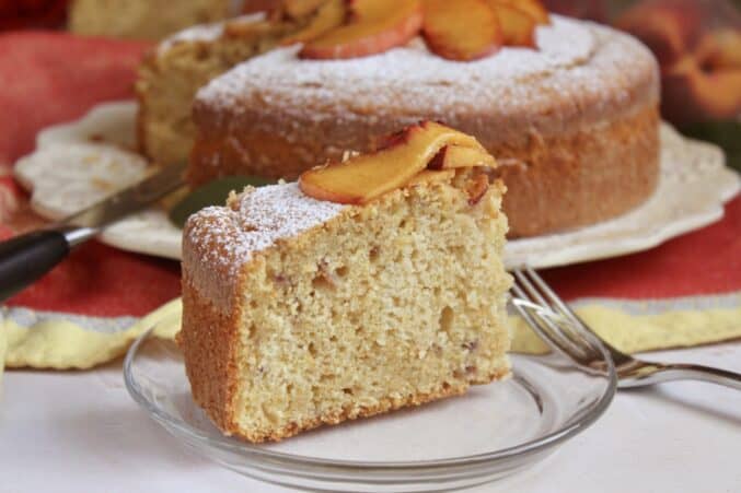 slice of peach cake on a plate