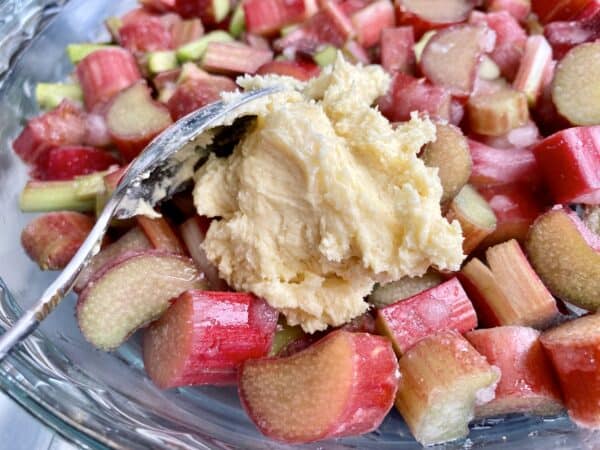 adding dough to fruit