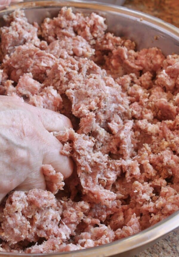 grinding pork meat