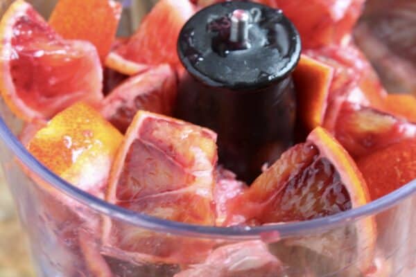 pieces of blood oranges in food processor
